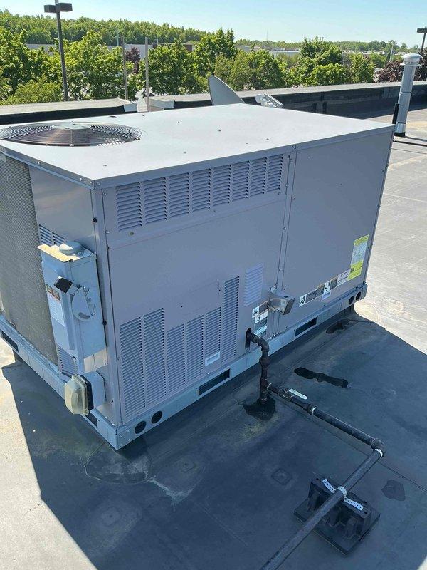 Performed scheduled commercial HVAC maintenance on rooftop Bryant Legacy packaged unit per maintenance agreement. Conducted comprehensive system inspection, verified operational status of all components including condenser coil and fan assembly, and documented equipment condition through photographic records. Filters to be replaced upon delivery to site.