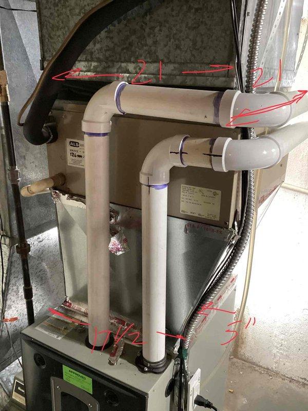 Conducted comprehensive assessment of 41-year-old air conditioning system installed in 1985 and located in basement. Documented existing air handler unit with compromised condensate drain pan experiencing active leakage, rendering equipment inoperable. Evaluated white cabinet-style air handling unit with PVC condensate drainage system, flexible ductwork connections, and associated electrical service panel. Photographed current system configuration including condensate piping with blue bands, metal ductwork, electrical breaker panel, and overall equipment placement for replacement estimate documentation. Provided detailed whole-home AC replacement quote for owner-occupied residence requiring complete system upgrade due to equipment age and failure of critical components.