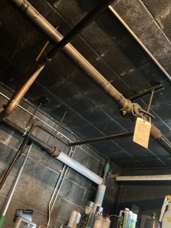 Performed gas line pressure test on commercial plumbing system utilizing 2" IP ball valve. Inspected mechanical room piping infrastructure including copper gas lines, valves, and associated fittings to verify system integrity and proper pressure retention. All components tested and documented per code requirements.