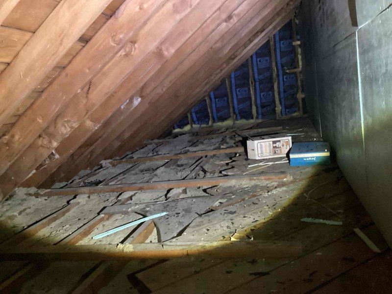 Conducted site assessment for new mini split system installation in upstairs bedroom with no existing HVAC equipment. Evaluated attic space for condenser line routing and confirmed adequate structural support for indoor air handler wall mounting. Inspected proposed installation location in bedroom and documented existing conditions. Photographed attic access point, available workspace, and designated wall mounting area to develop comprehensive installation plan and equipment specifications for customer approval.