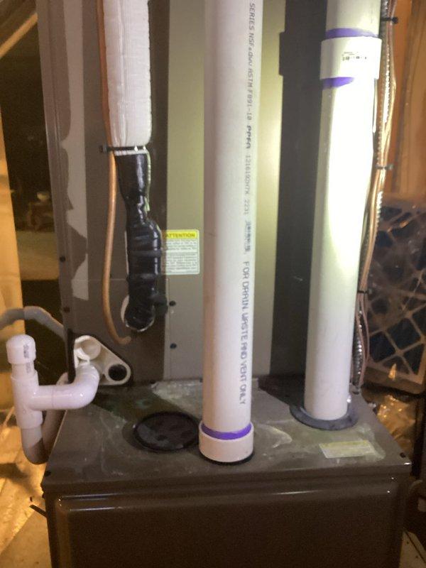 Completed full air conditioning system replacement for a medium-sized residential property with basement installation. Removed existing failed unit with repeated OFM motor failures that were no longer covered under warranty. Installed new air handler with proper ductwork connections, PVC condensate drain lines with appropriate pitch and trap configuration, and flexible connector piping. Ensured all refrigerant lines, electrical connections, and ventilation components were properly secured and sealed according to manufacturer specifications and local code requirements.
