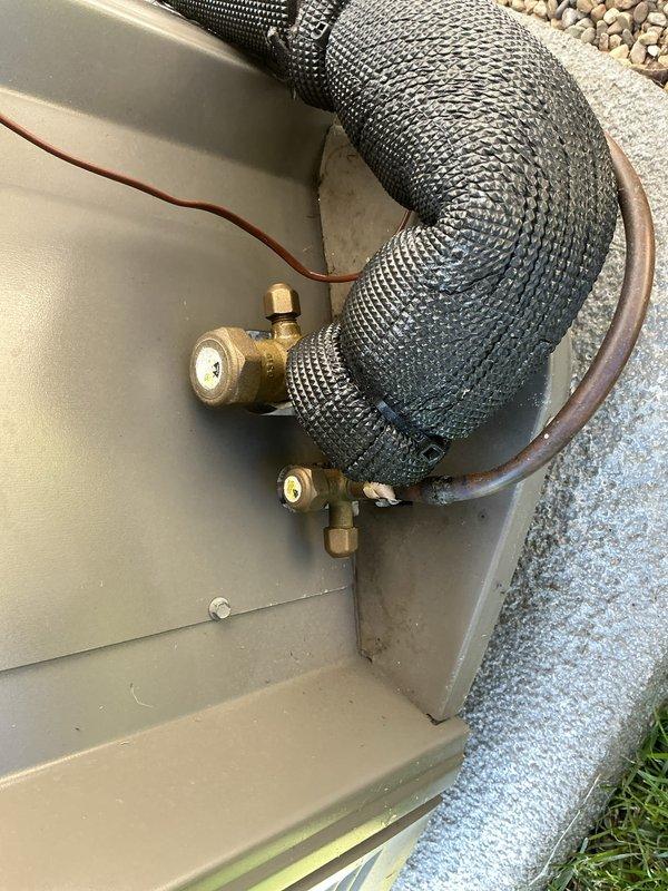 Completed comprehensive Gold AC Inspection on a 2-3 year old outdoor air conditioning unit as part of routine annual maintenance. Performed full system evaluation including inspection of electrical disconnect box, refrigerant line set with service valves, and all accessible components. Verified proper operation of copper refrigerant lines, brass service ports, and electrical connections. System found to be operating within normal parameters with no deficiencies noted at time of service.