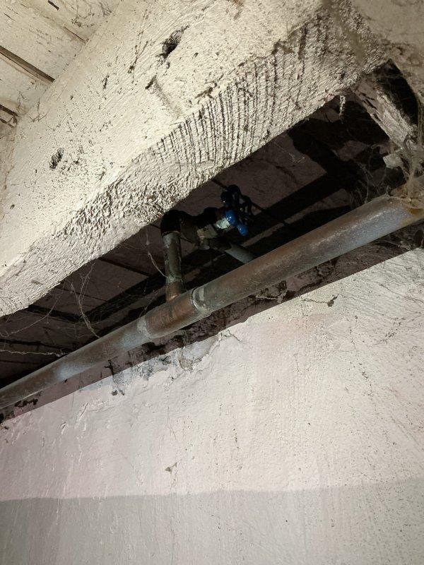 Replaced defective exterior hose bib mounted on home's siding due to failure of the outdoor water spout. Accessed plumbing connections through crawl space, disconnected old fixture from copper supply line, and installed new frost-free sillcock with proper sealing to prevent water intrusion through exterior wall penetration.