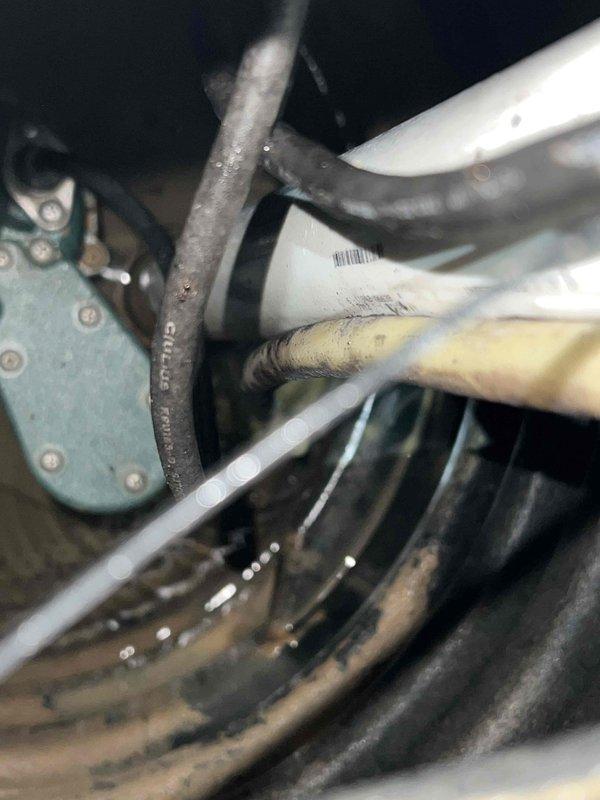 Completed comprehensive NSP AC inspection on single Bryant condensing unit with air handler located in basement. Inspected outdoor condenser unit positioned on concrete pad with proper clearance and landscaping maintenance, verified operational status of unit under 10 years old, examined evaporator coil and refrigerant line connections at indoor air handler, and provided complimentary air filters per maintenance agreement specifications.