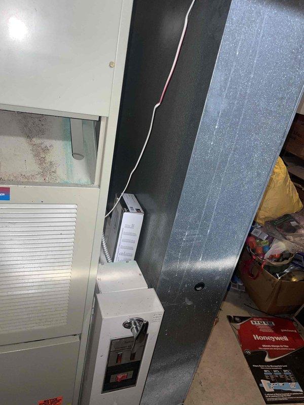 Evaluated dual-zone HVAC system with two 30-year-old air conditioning units and two 70% efficiency furnaces. Main floor AC system found completely empty of refrigerant, while second system (2005, R22) had failed capacitor and burnt contactor wiring. Provided comprehensive replacement estimate options ranging from single AC unit replacement to complete dual-system changeout including both air conditioners and furnaces, explaining efficiency benefits of complete system replacement versus partial upgrades.