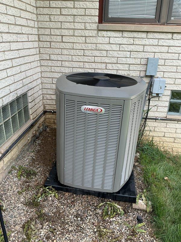 Completed comprehensive Gold AC Inspection on two residential cooling systems: a Lennox condenser unit and a Bryant condenser unit, both over 10 years old with outdoor air handler/coil configurations. Performed multi-point inspection including electrical connections, refrigerant levels, condenser coil cleaning, fan motor operation, and safety controls on both units. Identified need for air filter replacement and noted LED replacement bulbs to be provided for installation at follow-up visit.