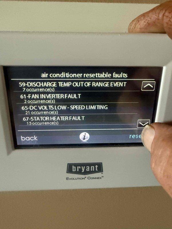 Responded to service call for 2015 Bryant Evolution Connex AC system displaying error codes and condenser communication failure. Upon arrival, accessed thermostat diagnostics revealing multiple active and resettable faults including Code 59 (Discharge Temp Out of Range Event - 7 occurrences), Code 74 (Discharge Temp Out of Range Lockout), Code 61 (Fan Inverter Fault - 2 occurrences), Code 65 (DC Volts Low/Speed Limiting - 21 occurrences), and Code 67 (Stator Heater Fault - 15 occurrences). Documented fault history and system events through thermostat interface, photographed diagnostic screens for record-keeping, and assessed compressor discharge temperature sensor and inverter board issues requiring further troubleshooting or component replacement.