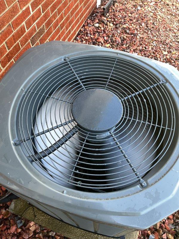 Completed comprehensive Gold AC inspection on 10-year-old single-unit air conditioning system with air handler located in basement. Performed thorough evaluation of outdoor condenser unit, which showed good overall condition with intact housing, properly secured fan guard, and functional components. Inspected refrigerant lines and associated piping in utility access area, noting age-appropriate weathering and surface oxidation on copper lines. Verified system operational status, documented equipment condition through photographic records, and confirmed all major components functioning as designed. Unit remains serviceable with normal wear patterns consistent with age of equipment.