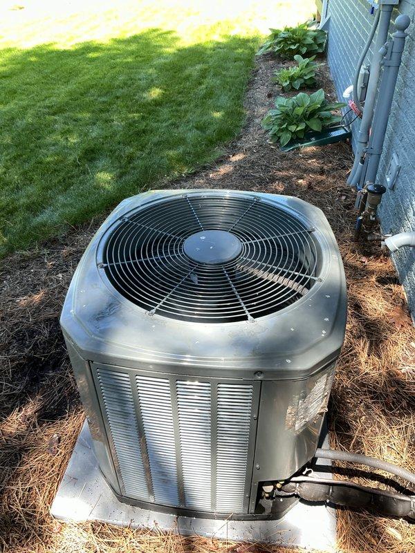 Completed comprehensive Gold AC Inspection on residential split system air conditioning unit less than ten years old. Performed thorough evaluation of outdoor condenser unit positioned on concrete pad, including visual inspection of cabinet condition, fan operation, and refrigerant line connections. Verified proper electrical supply at disconnect switch mounted on exterior wall and confirmed all safety controls functioning correctly. Inspected basement-located air handler and evaporator coil assembly. System found operating within normal parameters with adequate cooling capacity and no immediate service concerns identified.