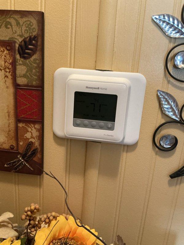 Completed comprehensive Gold plan AC inspection on 1-year-old air conditioning system. Performed full preventive maintenance tune-up including inspection of outdoor unit located in front of deck, indoor air handler components, refrigerant lines, electrical connections, and thermostat operation. Verified Honeywell Home ProSeries thermostat functioning properly at 71 degrees. Inspected all mechanical connections, ductwork, and piping for proper operation and wear. No issues or deficiencies identified during inspection. System operating within normal parameters with no customer-reported symptoms or concerns. All components found in good condition appropriate for equipment age. Maintenance completed as scheduled with system ready for continued service through next maintenance cycle in 2026.