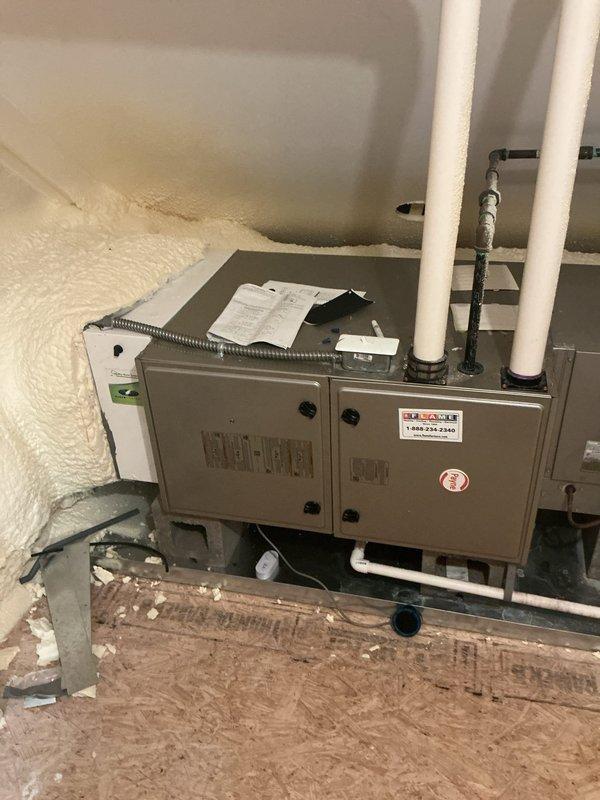 Responded to a complete A/C system shutdown with water leakage on a five-year-old unit located on the third floor. Upon inspection of the attic-mounted HVAC system, identified and addressed drainage issues affecting the condensate removal system. Verified proper operation of the condensate drain lines, checked the primary and secondary drain pans for blockages, and ensured all PVC drainage piping was functioning correctly. Tested system operation to confirm unit cycling properly without premature shutdown, inspected evaporator coil and drain pan assembly for proper water flow, and verified all safety switches were operating within normal parameters. Unit restored to full operational status with no further water leakage detected.