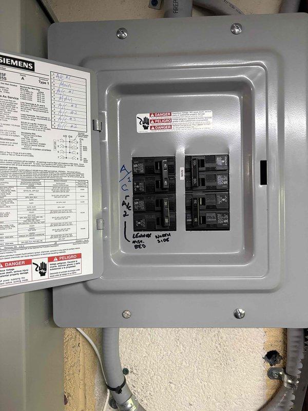 Completed electrical install warranty service to properly label HVAC equipment for safety and code compliance. Installed identification label at outdoor AC condenser unit indicating corresponding electrical panel and circuit breaker assignment. Updated interior electrical panel documentation to clearly mark which breaker controls the air conditioning system. All labeling ensures proper circuit identification for future service and emergency shutoff procedures.