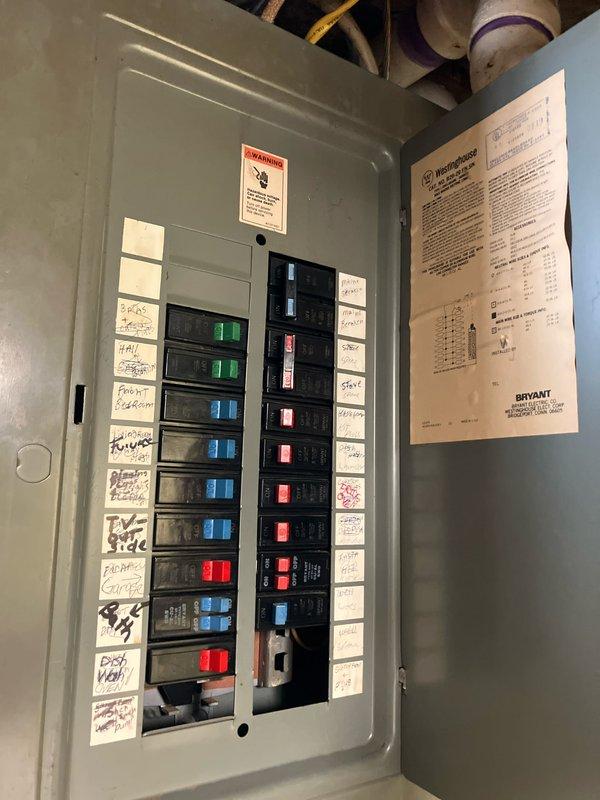 Provided comprehensive estimate for complete air conditioning system replacement due to non-functional 13-year-old unit with refrigerant leak. Assessed existing outdoor condenser unit, basement-mounted evaporator coil, electrical service panel, and natural gas furnace compatibility for new equipment installation. Documented current system configuration including electrical connections and outdoor unit placement to prepare detailed replacement proposal.