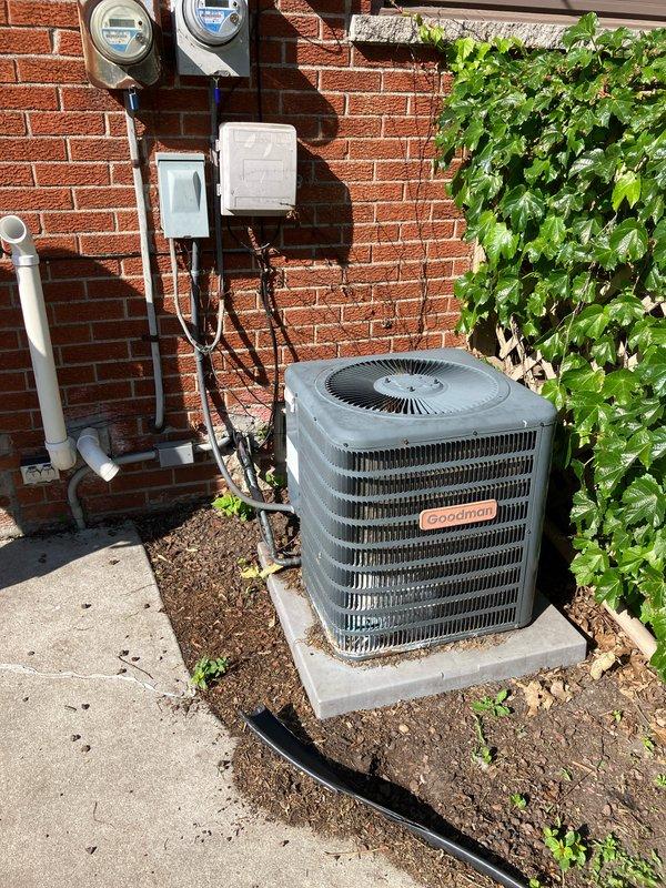 Provided comprehensive estimate for complete air conditioning system replacement due to non-functional 13-year-old unit with refrigerant leak. Assessed existing outdoor condenser unit, basement-mounted evaporator coil, electrical service panel, and natural gas furnace compatibility for new equipment installation. Documented current system configuration including electrical connections and outdoor unit placement to prepare detailed replacement proposal.