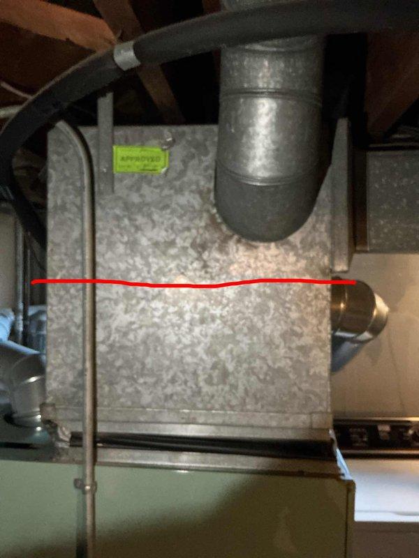 Completed comprehensive estimate for full HVAC system replacement including 40-year-old furnace located in basement, air conditioning unit, and hot water tank. Photographed existing equipment showing aged air handler with significant dust accumulation and deteriorated ductwork in confined mechanical space. All current units operational at time of assessment.