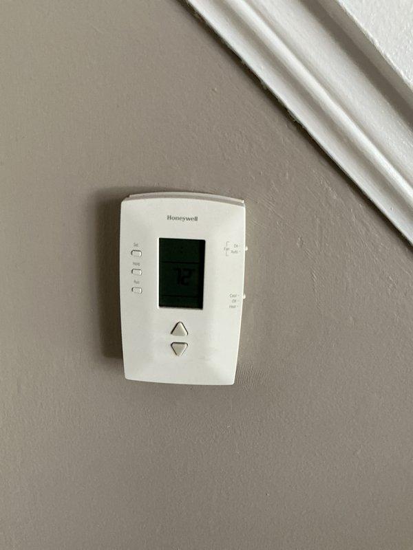 Provided comprehensive estimate for complete HVAC system replacement of 24-year-old air conditioning unit with basement-located evaporator coil. Assessed existing equipment configuration including air handler and associated components, documented current system condition through photographic inspection of thermostat controls and mechanical equipment layout, and prepared detailed replacement specifications for full system upgrade.