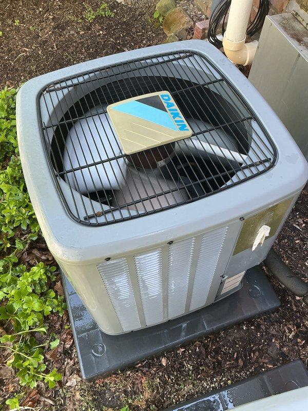 Completed comprehensive Gold AC inspection on two residential air conditioning units, both less than 10 years old and operational at time of service. Performed multi-point inspection protocol on outdoor condenser units including visual assessment of cabinet condition, fan grille guards, mounting pad stability, and proper drainage system function. Verified both units positioned on appropriate plastic mounting pads with adequate clearance for airflow and service access. Inspected condensate drain lines, electrical connections, and surrounding area for proper installation standards. Both systems confirmed operational with no immediate concerns identified during inspection. Documentation and photographic records completed for service file.