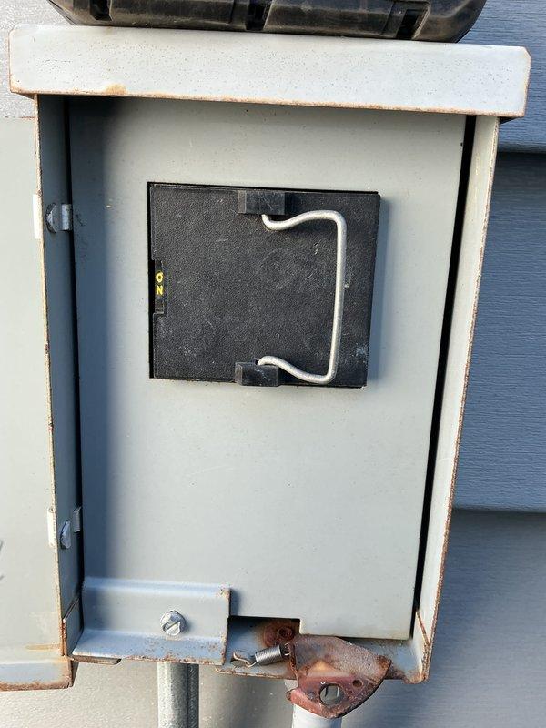 Responded to service call for AC short cycling and high fluctuating humidity issues on 5-year-old Trane system. Found standing water in outdoor condensate drain pan following recent installer adjustment; released drain plug to clear accumulated water. Performed AC tune-up including system inspection, cleaning of outdoor unit which showed weathering and debris accumulation, and verification of proper drainage function. Addressed humidity fluctuations displayed on Ecobee thermostat by ensuring condensate system was draining properly and system cycling was operating within normal parameters.