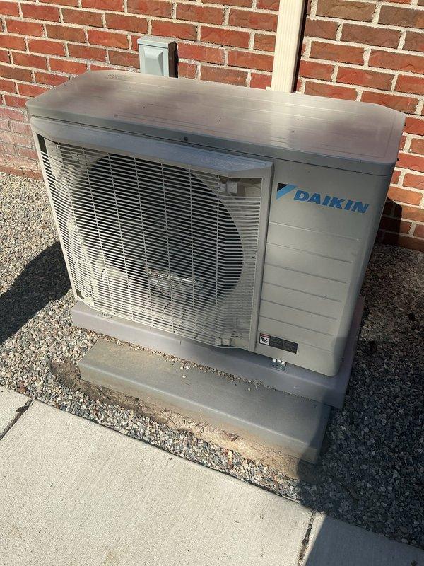 Completed comprehensive Gold AC Inspection on two Daikin HVAC systems with air handlers located in basement and attic. Performed full system evaluation including visual inspection of outdoor condenser units, verified proper operation of all components, checked refrigerant levels, inspected electrical connections, and assessed overall system performance. Both units found to be in good working condition with no visible damage, proper installation on concrete pads with adequate drainage, clean coils, and normal operating parameters confirmed for equipment under 10 years old.