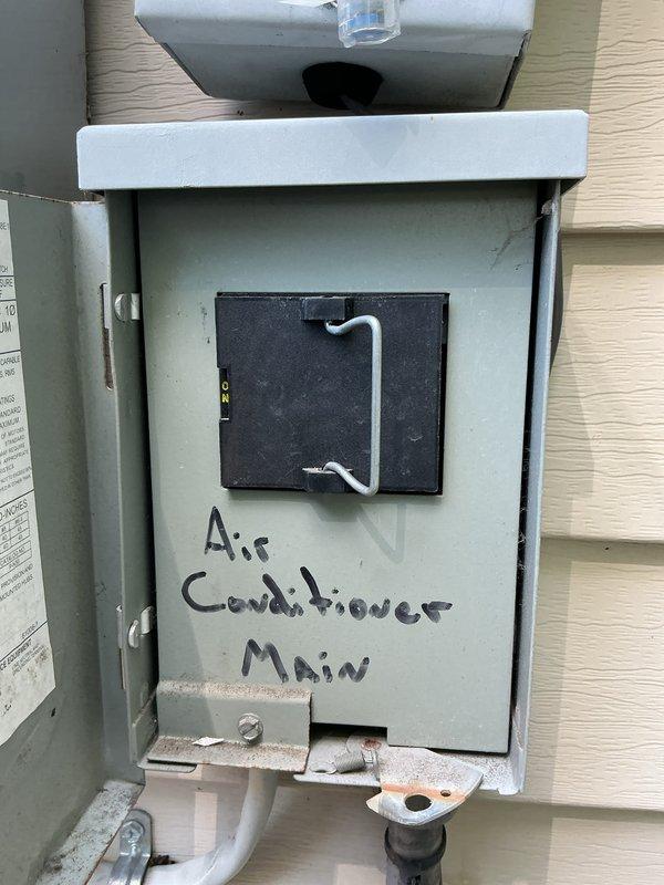 Completed comprehensive Gold AC inspection on a 2-year-old residential air conditioning system. Performed visual inspection of outdoor condensing unit, confirming proper fan operation, clean coil surfaces, and secure wire guard assembly. Verified electrical disconnect box functionality and proper labeling. Inspected air handler and evaporator coil located in basement. All system components operating within normal parameters with no deficiencies noted at time of inspection.