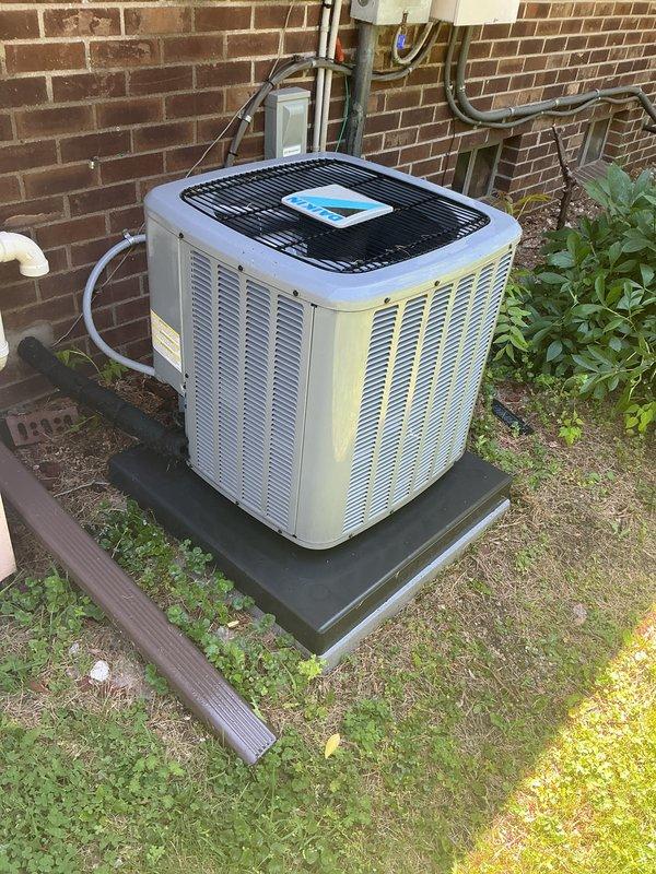 Completed comprehensive Gold AC inspection on 8-year-old residential cooling system with air handler located in basement. Performed full system evaluation of outdoor condenser unit and associated components, verifying proper operation of compressor, condenser fan, electrical connections, refrigerant lines, and disconnect switch. Inspected condenser coil condition, checked clearances around unit, and confirmed system is operating within normal parameters with no immediate service needs identified.