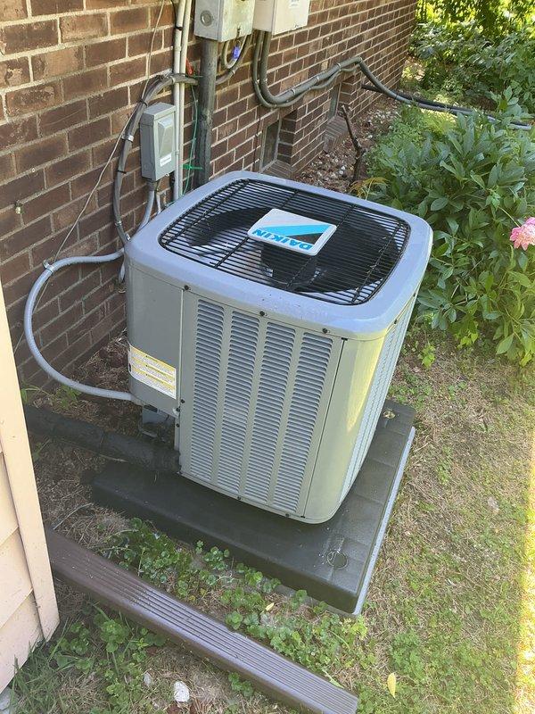 Completed comprehensive Gold AC inspection on 8-year-old residential cooling system with air handler located in basement. Performed full system evaluation of outdoor condenser unit and associated components, verifying proper operation of compressor, condenser fan, electrical connections, refrigerant lines, and disconnect switch. Inspected condenser coil condition, checked clearances around unit, and confirmed system is operating within normal parameters with no immediate service needs identified.
