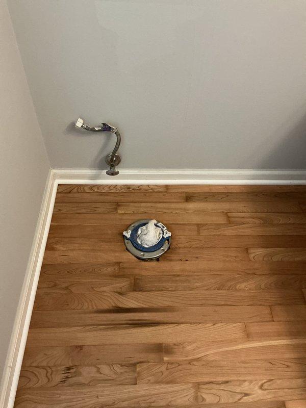 Reinstalled first-floor toilet, ensuring proper seating, wax ring seal, and water supply connection with verification of secure mounting and leak-free operation. Evaluated newly installed sump pump system, inspecting discharge piping, check valve installation, basin cover seal, and electrical connections to confirm proper functionality and code compliance.