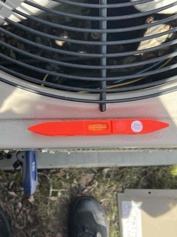 Responded to service call regarding non-operational condenser unit on 2015 AC system with basement air handler. Upon arrival, performed diagnostic inspection of outdoor condenser unit and confirmed fan motor failure, though homeowner reported adequate cooling performance during equipment malfunction. Conducted temperature and operational testing, documenting ambient conditions at 91.2°F and verifying unit levelness. Identified condenser fan not running while compressor remained operational, explaining temporary cooling capability. Provided diagnosis and repair recommendations to restore full system functionality.