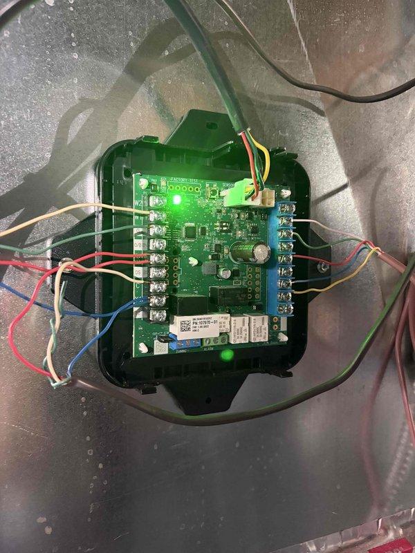 Responded to no cooling complaint on 1-year-old system with blower operational but no refrigerant circulation. Upon inspection, diagnosed failed control board preventing compressor operation while allowing indoor blower to function normally. Replaced defective control module and verified proper system startup, restoring full cooling capacity to the unit.