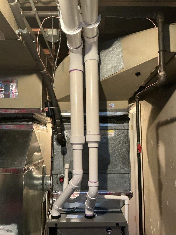 Completed installation of 110,000 BTU furnace with humidifier and chimney liner, along with 75-gallon Bradford White natural gas water heater (Model RG275H6N, 76,000 BTU input). Installed all necessary PVC venting and drainage systems, reconnected existing utilities, and secured mechanical permit for the complete HVAC system replacement.