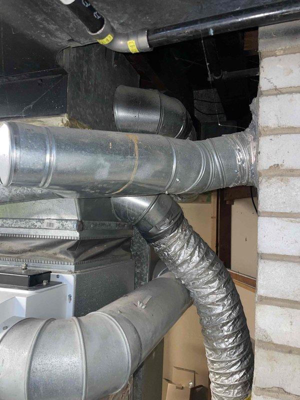 Completed comprehensive assessment of non-functional R22 central air conditioning system experiencing fan motor failure. Evaluated existing equipment and determined system required outdoor fan motor, capacitor, and contactor replacement. Due to age of R22 system and availability of refrigerant, provided detailed estimate for complete HVAC system replacement including new air handler and condensing unit. Documented existing ductwork configuration and mechanical installation area for replacement specifications.