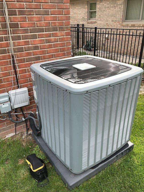 Responded to water leak complaint on 4-year-old furnace located in basement. Upon arrival, unit was operational and maintaining heat. Inspected furnace and associated condensate drainage system, including white PVC piping configuration. Examined condensate trap, drain lines, and connections for blockages or improper pitch. Verified primary and secondary drain line routing and functionality. Checked evaporator coil area for excessive condensation or overflow conditions. Assessed furnace operation and cycling to identify source of water accumulation. Return visit scheduled to complete diagnostics and repairs during warmer ambient temperatures for optimal system evaluation.