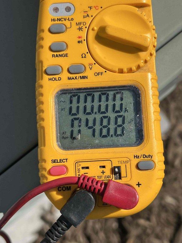 Completed comprehensive Gold AC Inspection on 19-year-old air conditioning system located on east side of property. Performed full system diagnostics including electrical testing of control components using digital multimeter, recording capacitor readings of 298.2 MFD. Inspected contactor assembly, control relays, and all electrical connections within junction box. Verified proper operation of all safety controls and sequencing relays. Cleaned and tightened electrical terminals. System operating within normal parameters with no deficiencies noted at time of inspection.