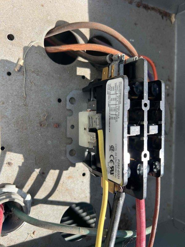 Completed comprehensive Gold AC Inspection on 19-year-old air conditioning system located on east side of property. Performed full system diagnostics including electrical testing of control components using digital multimeter, recording capacitor readings of 298.2 MFD. Inspected contactor assembly, control relays, and all electrical connections within junction box. Verified proper operation of all safety controls and sequencing relays. Cleaned and tightened electrical terminals. System operating within normal parameters with no deficiencies noted at time of inspection.