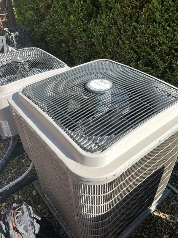 Completed comprehensive tune-up maintenance on four 5-year-old air conditioning units located at the property. Performed standard preventative maintenance procedures on all systems including inspection of condenser units, verification of proper airflow through louvered panels and top grilles, checked compressor operation, and replaced air filter as part of service. All four AC units were found to be in operational condition with normal wear consistent with outdoor installation and age, with no major deficiencies noted during inspection.