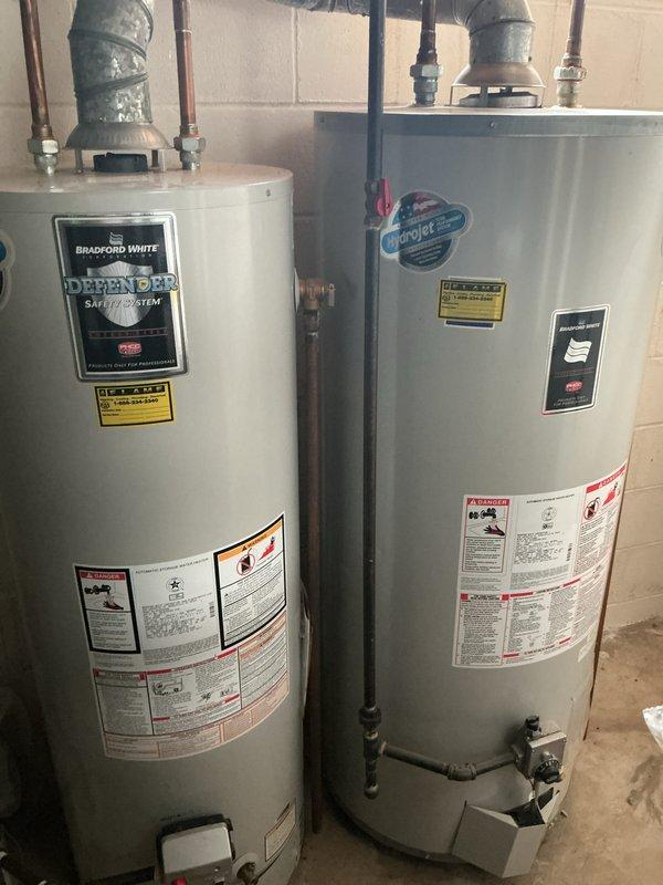 Completed comprehensive Gold AC inspection on a multi-unit residential system with equipment over 10 years old. Inspected outdoor condenser unit with beige housing, verified proper fan operation and structural integrity, confirmed unit was free of debris and showed normal weathering with no significant damage or deterioration. Basement air handler/coil location inspected and documented, system operational and functioning as designed at time of service.
