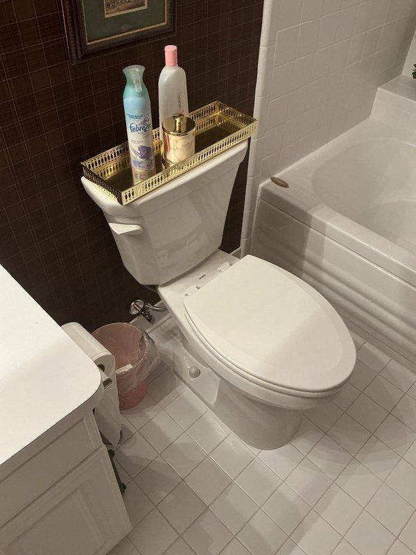 Completed installation of two new white porcelain two-piece toilets in separate bathroom locations per approved estimate. Both fixtures were properly positioned, secured, and connected to existing water supply lines with chrome shut-off valves. All wax ring seals were installed, mounting bolts tightened to specification, and water connections tested for proper operation and leak-free performance.