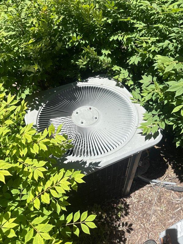 Completed comprehensive Gold AC Inspection and tune-up on residential air conditioning system as part of plan membership maintenance. Performed full system evaluation including inspection of outdoor condenser unit, capacitor, electrical connections, and all accessible components. Verified proper operation of fan motor, compressor, and controls. Checked refrigerant levels, cleaned condenser coils, and inspected all wiring connections for signs of wear or damage. System found to be operating within normal parameters with no immediate repairs required. Unit is positioned in landscaped area with adequate clearance and airflow around condenser. All safety checks passed and system is ready for continued seasonal operation.