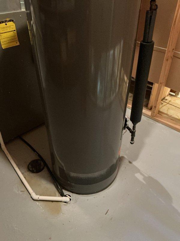 Conducted on-site assessment for HVAC system replacement in basement mechanical room. Evaluated existing 19-year-old furnace and air conditioning system, documented current equipment configuration including water heater placement, PVC condensate drainage lines, and existing ductwork connections. Photographed equipment layout and provided comprehensive replacement quote for new furnace and air conditioner installation.