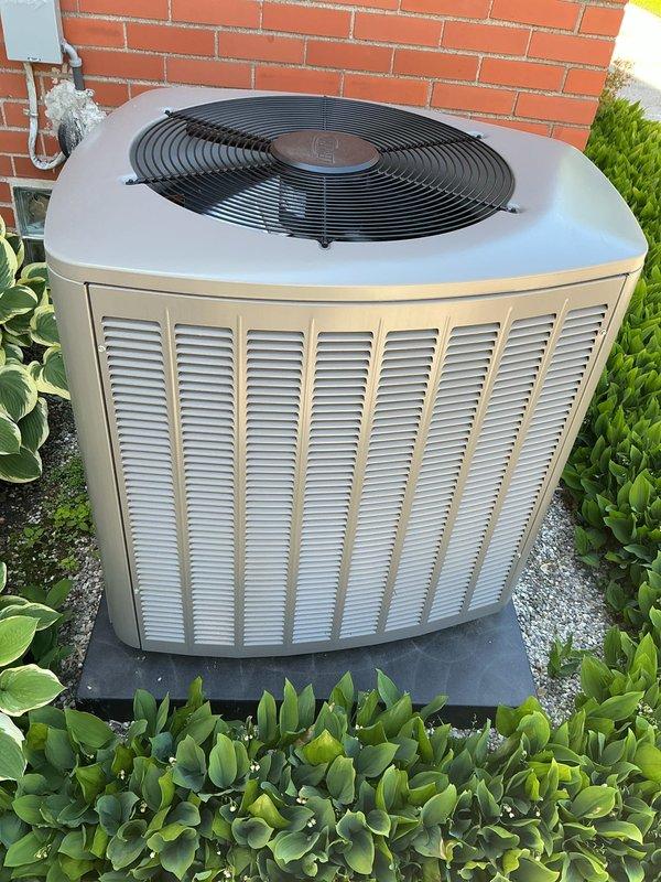 Completed Gold AC inspection on residential cooling system with outdoor condensing unit and basement air handler. Performed comprehensive evaluation of equipment operation, verified system functionality, and conducted visual inspection of condenser unit positioned on pad against exterior brick wall. Delivered complimentary air filter as part of Gold maintenance program, confirmed unit operating properly with clean, well-maintained exterior surfaces and proper clearances from surrounding landscaping.