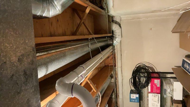 Completed full HVAC system installation including a 90,000 BTU high-efficiency furnace and 3-ton air conditioning unit with rear discharge configuration. Installed new ductwork routing through basement floor joists with proper support and sealing, connected galvanized metal ducting with flexible transitions as needed. Mounted air handler in utility area with appropriate clearances for service access and code compliance. Installed humidifier system integrated with furnace operation and established proper condensate drainage using PVC piping. Reconnected all electrical, plumbing, and mechanical components to ensure proper system operation. Requested and coordinated mechanical, plumbing, and electrical permits for the installation. System was configured to meet AHRI certification standards and qualified for applicable utility rebates. All equipment installed per manufacturer specifications with proper venting, drainage, and safety controls verified operational.