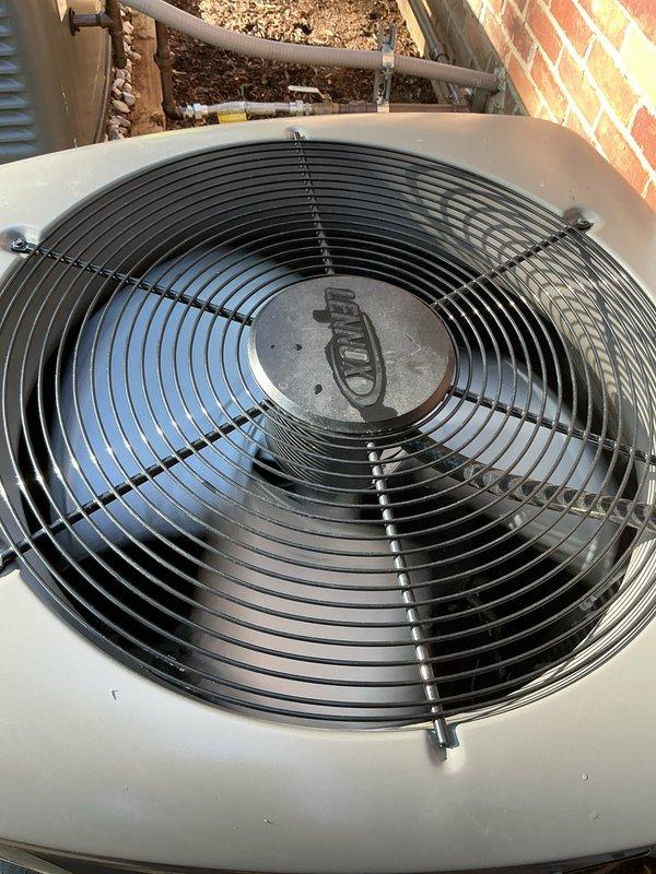 Completed comprehensive Gold AC inspection on 2-year-old residential split system with air handler located in basement. Performed full system evaluation including visual inspection of outdoor condensing unit with fan assembly, verified proper capacitor connections and electrical components, checked refrigerant lines, and confirmed all equipment operating within normal parameters. Both units found in good working condition with no deficiencies noted.