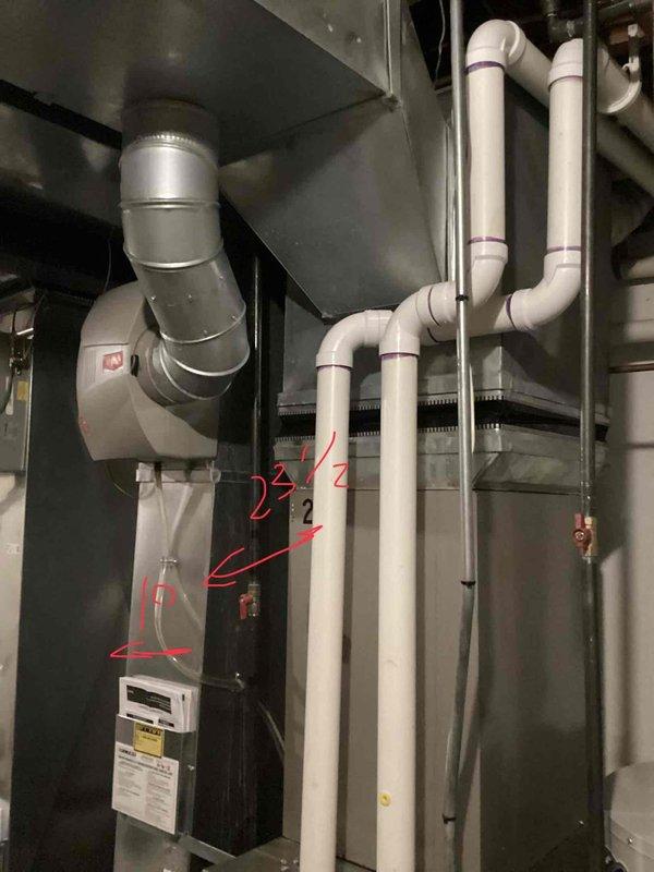 Conducted on-site assessment and measurements for replacement estimate of two air conditioning units and one furnace system. Primary concern addressed was a 9-month-old furnace experiencing water leakage onto the basement floor, requiring warranty verification and evaluation for potential replacement. Documented existing HVAC equipment configuration, including air handler unit, ductwork connections, PVC condensate drain lines, and clearance dimensions to determine proper replacement specifications and installation requirements.