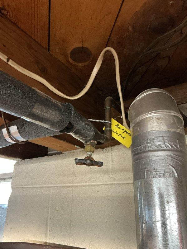 Responded to service call for leaking valve connected to exterior spigot. Accessed plumbing system in basement crawl space where supply lines route to outdoor fixtures. Repaired leaking valve assembly on water line serving outside spigot, ensuring proper seal and operation to eliminate water loss and restore full functionality to exterior water source.