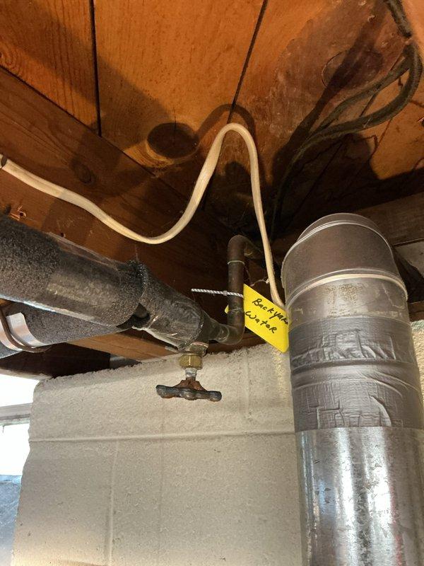 Responded to service call for leaking valve connected to exterior spigot. Accessed plumbing system in basement crawl space where supply lines route to outdoor fixtures. Repaired leaking valve assembly on water line serving outside spigot, ensuring proper seal and operation to eliminate water loss and restore full functionality to exterior water source.