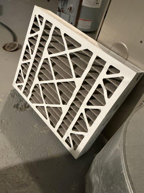 Completed comprehensive Gold AC Inspection and maintenance service on two residential air conditioning systems, one approximately five years old and one of undetermined age. Performed full system diagnostics including refrigerant level checks, electrical component testing, condenser and evaporator coil inspection and cleaning, condensate drain line service, and thermostat calibration verification on both outdoor units. Inspected air handler components and replaced dirty air filter in basement mechanical room to improve airflow and system efficiency. Documented crawl space ductwork condition, noting damaged flexible duct sections requiring future attention to prevent energy loss and maintain proper system performance. Verified proper system operation, amperage draws, and temperature differentials across both units. All accessible components lubricated, electrical connections tightened, and safety controls tested per manufacturer specifications. Both systems currently operating within no