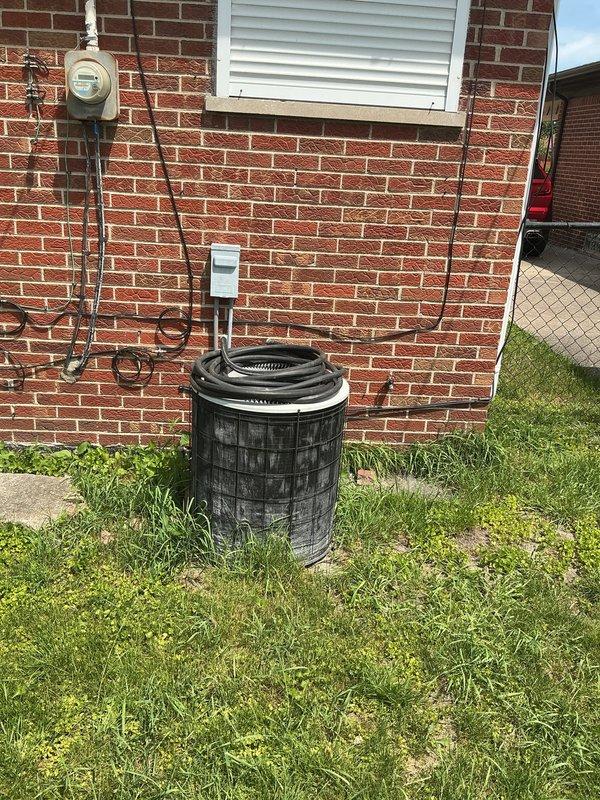 Provided comprehensive estimate for complete HVAC system replacement at residential property with 40+ year old air conditioning unit currently located in basement. Assessed existing natural gas furnace and air conditioning equipment, evaluated electrical service connections and metering infrastructure at exterior brick wall, and documented site conditions to develop replacement specifications for new heating and cooling system.