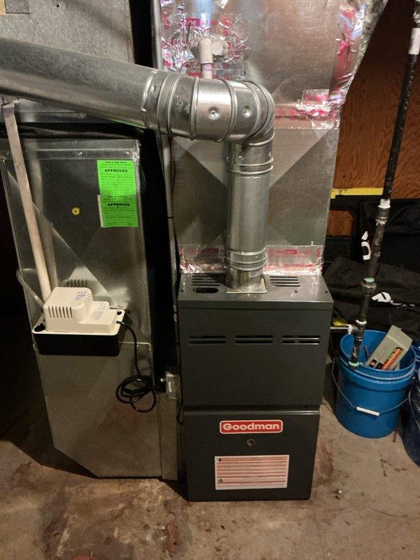 Completed routine tune-up on 7-year-old Goodman furnace located in basement. Performed comprehensive inspection of all system components, verified proper operation of blower motor, heat exchanger, ignition system, and gas valve. System found to be operating within normal parameters with no deficiencies noted; no repairs required at this time.