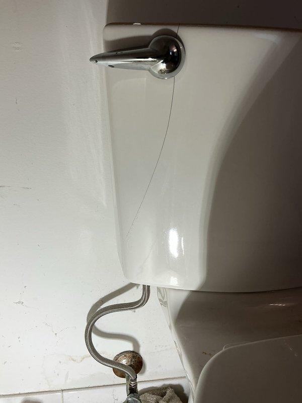 Responded to a water leak from the toilet supply hose in a residential bathroom. Upon arrival, inspected the flexible braided supply line connecting the fill valve to the wall shut-off and identified the source of the active leak. Replaced the defective supply hose with a new braided stainless steel line, ensuring proper connections at both the tank inlet and wall valve, then tested the system for leaks and verified proper operation of the fill valve and flush mechanism.