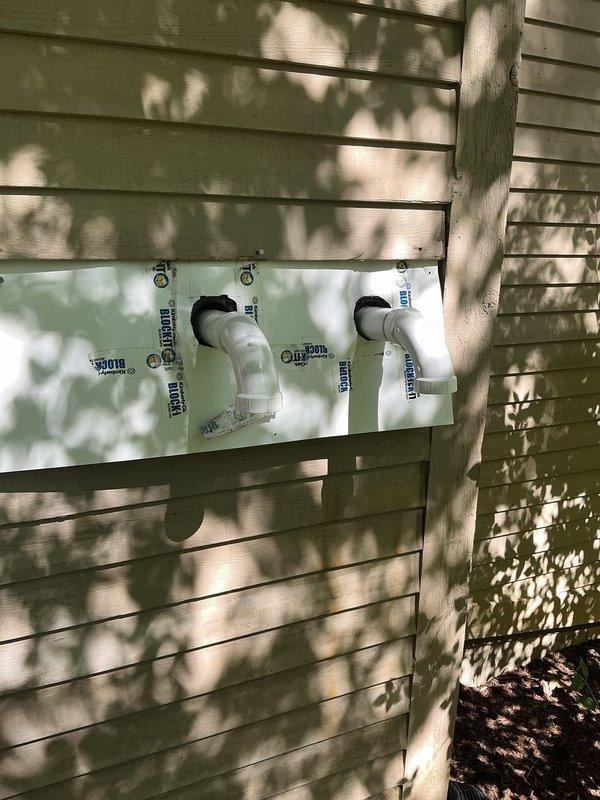 Returned to complete power vent water heater venting repair with materials retrieved from shop. Installed proper PVC venting configuration through exterior wall with secure mounting and appropriate fittings, ensuring code-compliant exhaust termination and intake air supply for safe water heater operation.
